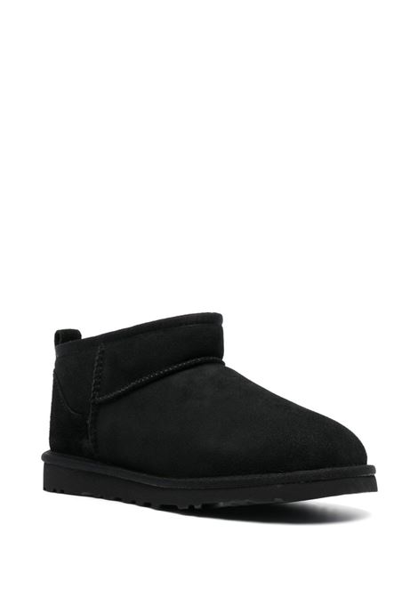 classic ultra mini boot man black in leather UGG | 1137391BLK