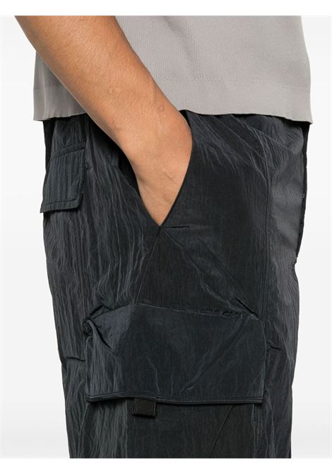 pantaloncini reverse cargo uomo neri OAKLEY | FOA40683802E